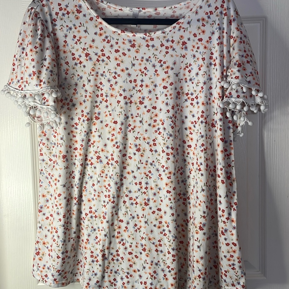 Floral print with pompom detail